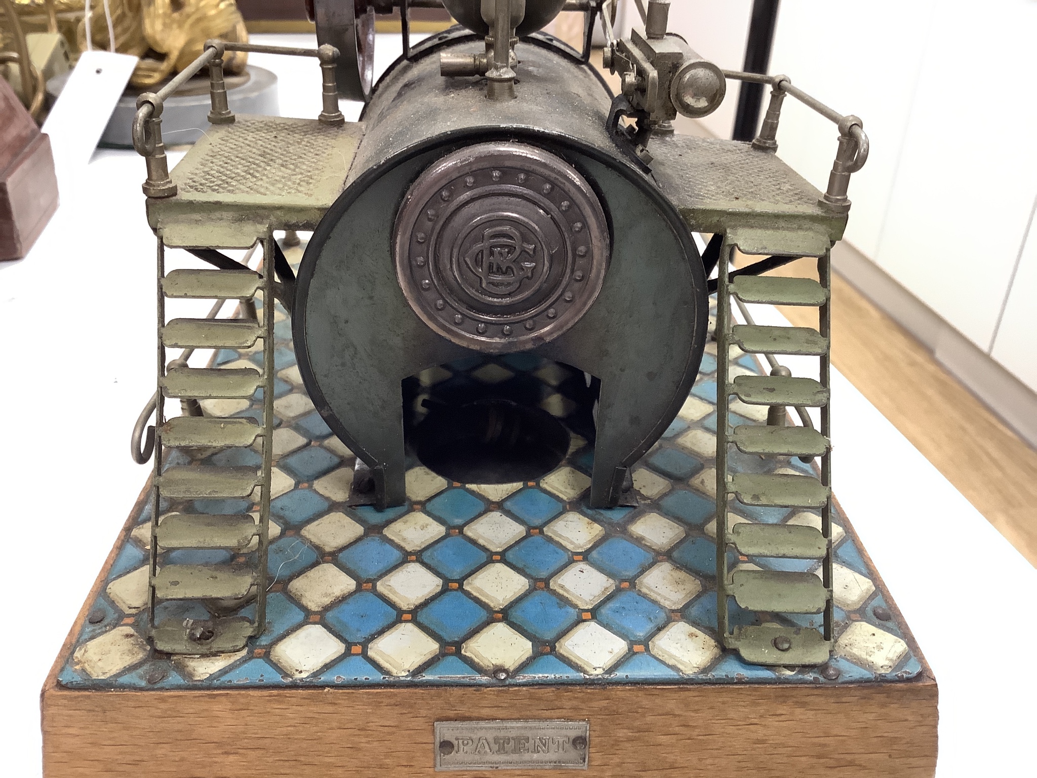 A Bing tinplate stationery engine, a boxed Jaques ‘The Angelo’, a toy fort and lead soldiers, a steam engine and other various toys and board games